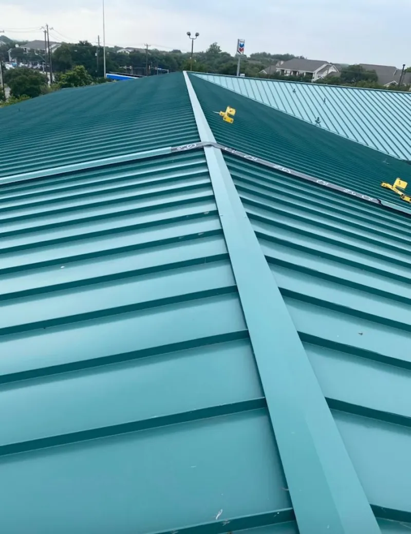 Green commercial metal roof ridge and valley for Metal Roof Repair in Mapleton