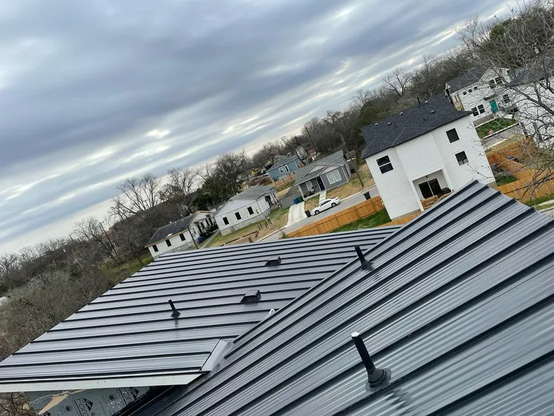 Standing seam metal roof panels with vents for Skylight Repair in Mapleton